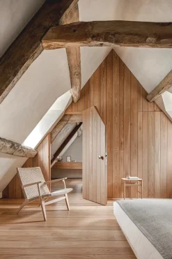 CH25 Loungestol, eg sortmalet med naturflet af Hans J. Wegner