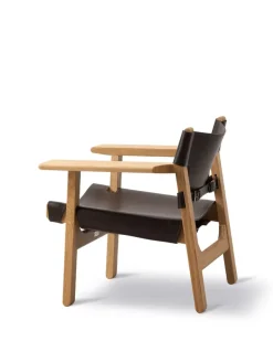 Den Spanske Stol i mørkebrun læder, eg olie af Børge Mogensen