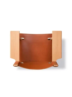 Den Spanske Stol i mørkebrun læder, eg sæbe af Børge Mogensen