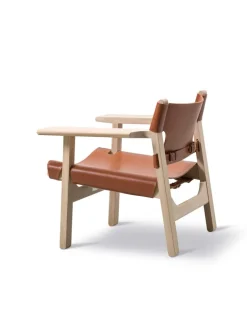 Den Spanske Stol i sort læder, eg sort lak af Børge Mogensen