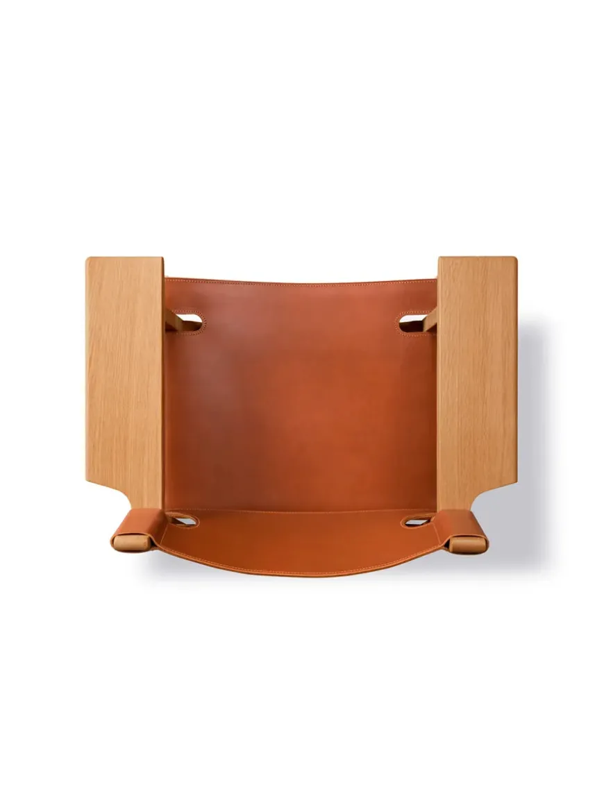 Den Spanske Stol i sort læder, eg olie af Børge Mogensen