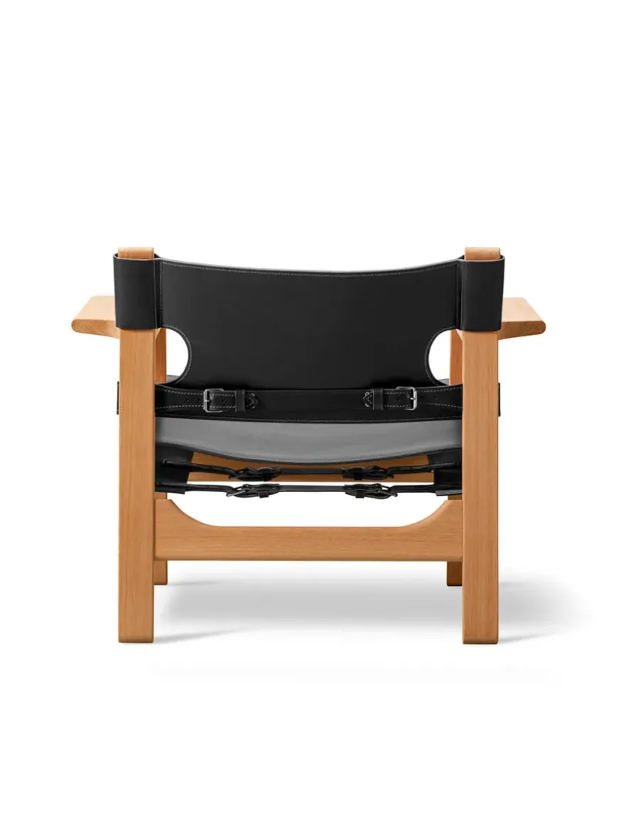 Den Spanske Stol i sort læder, eg olie af Børge Mogensen