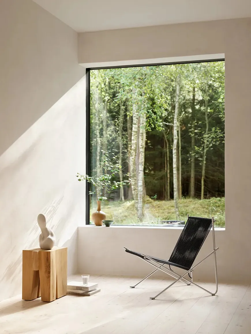 PK4 Loungestol i sort, stålstel af Poul Kjærholm